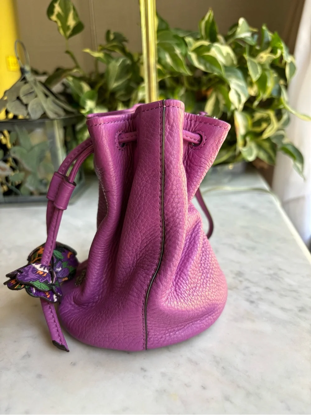 Coach Petal Pebbled Leather Drawstring Wristlet in Purple